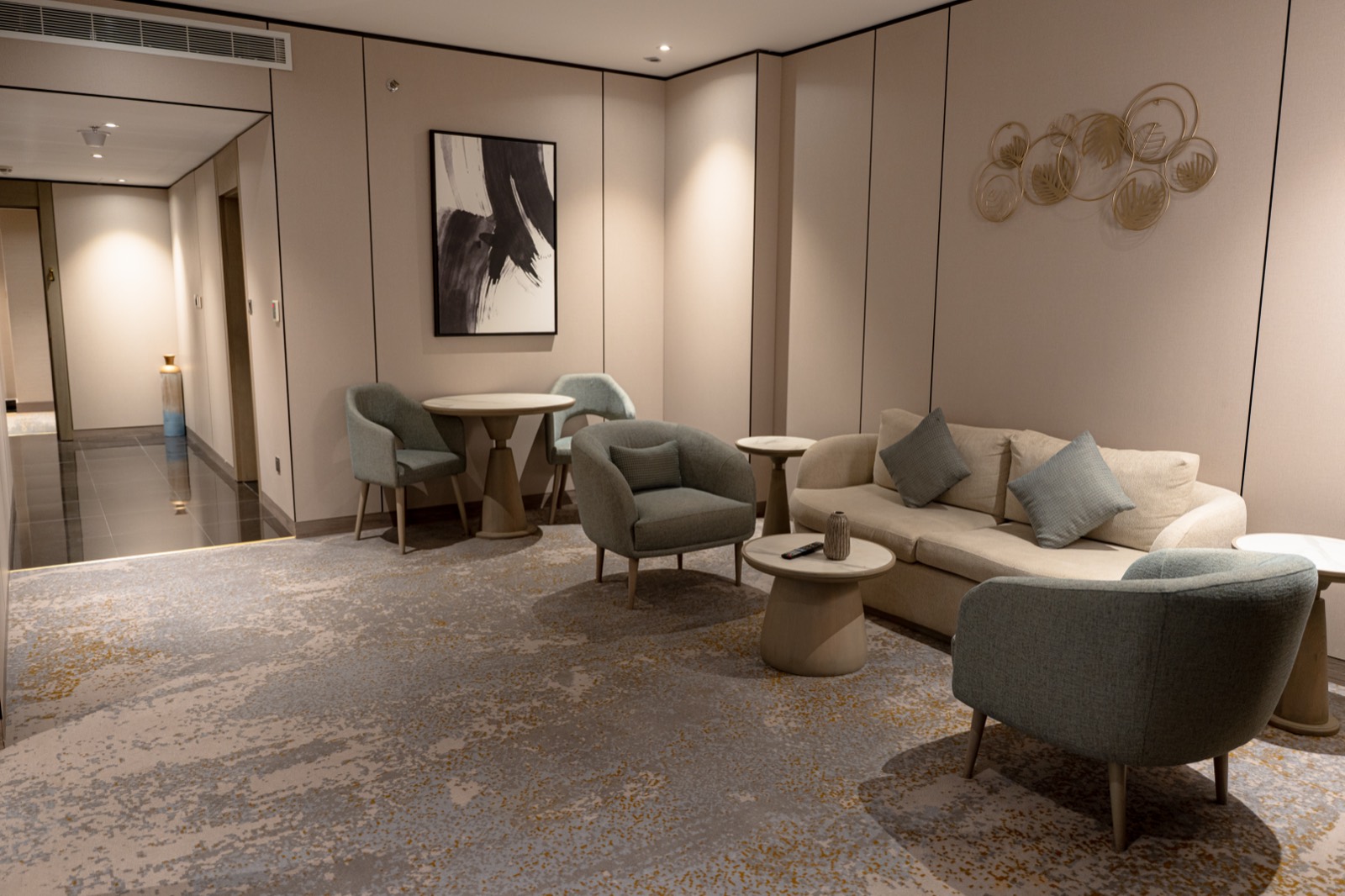 The Junior Suite living room, looking through to the entrance