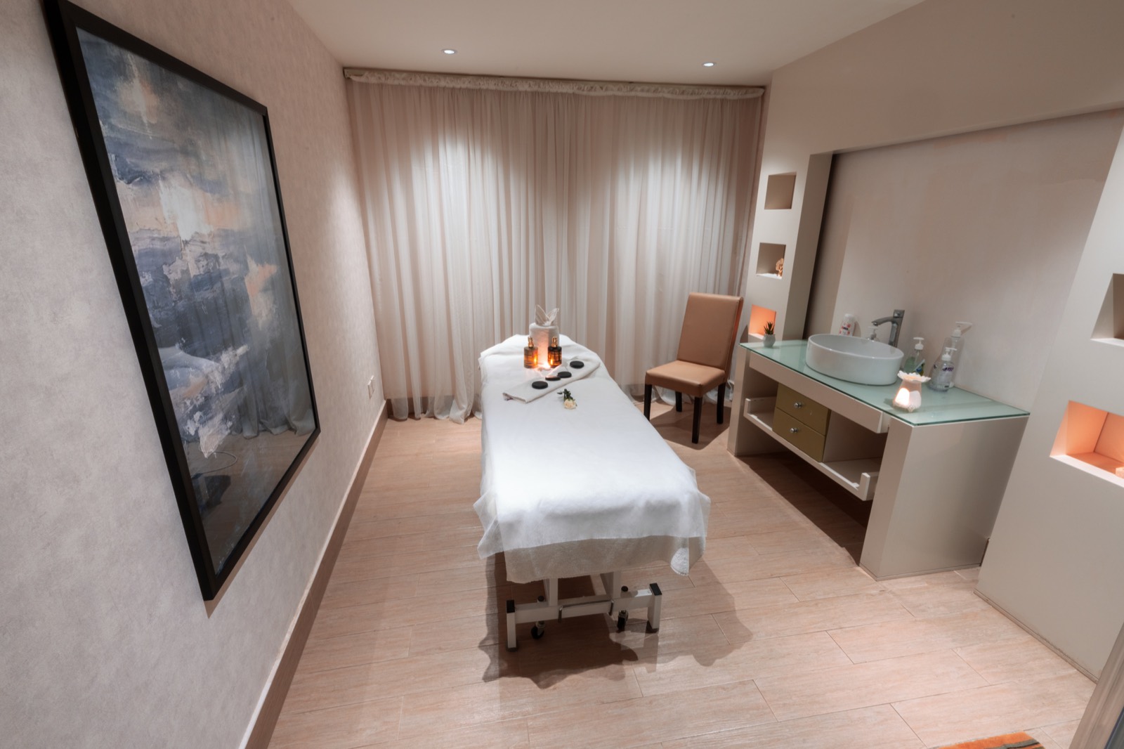 A treatment room with its massage table prepared