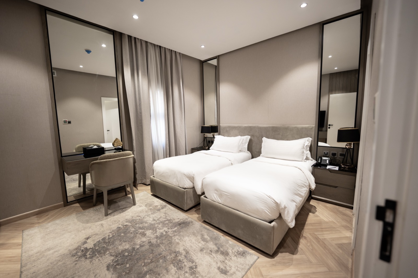 A villa bedroom with twin beds